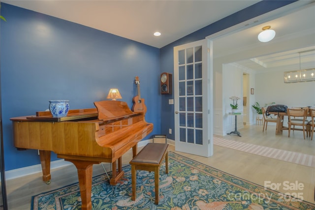 15216 Shallow Ridge Rd, Charlotte, NC 28278 - sitting room with wood finished floors, baseboards, ornamental molding, and recessed lighting