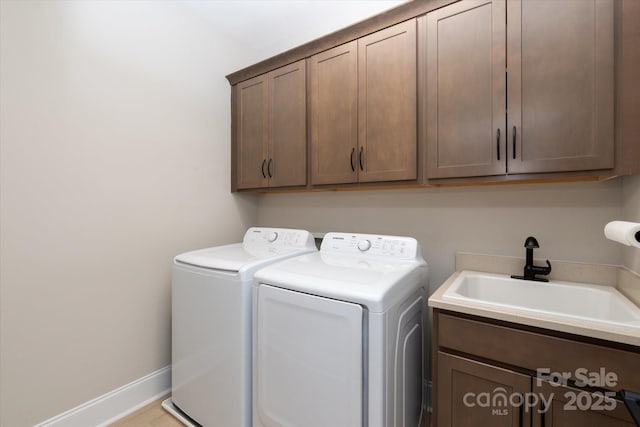20216 Shaffer Bach Ln, Charlotte, NC 28277 - washroom featuring cabinet space, washing machine and dryer, and baseboards