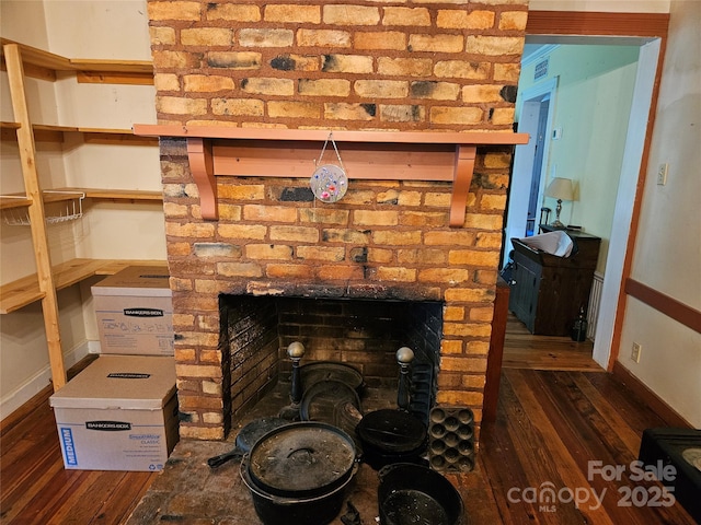 368 Settlemyre Rd, Morganton, NC 28655 - detailed view of wood finished floors, a fireplace, and baseboards