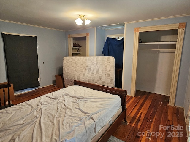 368 Settlemyre Rd, Morganton, NC 28655 - bedroom with crown molding, wood finished floors, and a closet