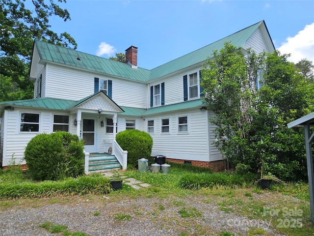 368 Settlemyre Rd, Morganton, NC 28655 - view of front of house with a chimney and metal roof