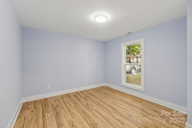 5414 Leaford Ct, Charlotte, NC 28227 - spare room with light wood-type flooring and baseboards