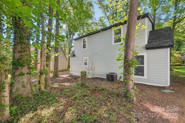 5414 Leaford Ct, Charlotte, NC 28227 - back of house featuring roof with shingles and central air condition unit
