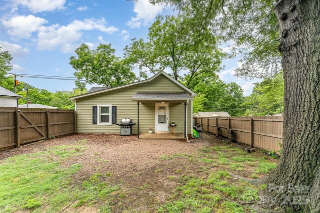 910 W A St, Kannapolis, NC 28081 - back of house featuring a fenced backyard