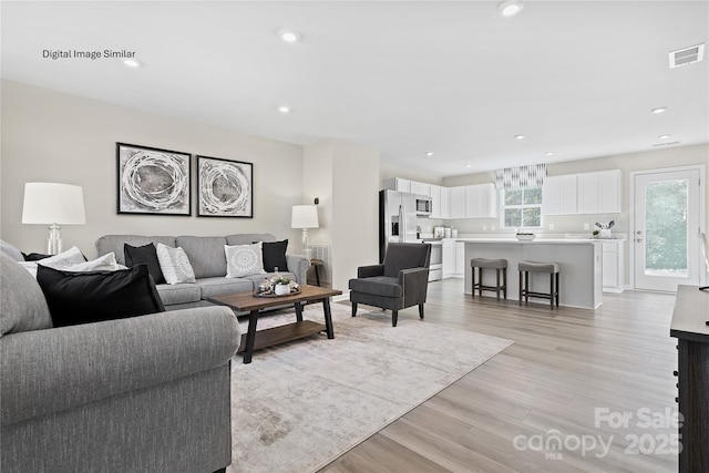 202 Rose Ln Unit 1501, Pageland, SC 29728 - living room featuring light wood finished floors and recessed lighting