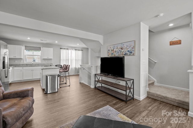 718 Dillon Way Unit 38, Fort Mill, SC 29715 - living room featuring wood finished floors and recessed lighting