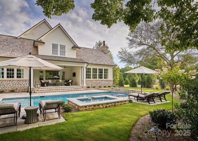 2270 New Gray Rock Rd, Fort Mill, SC 29708 - outdoor pool featuring a yard, an in-ground hot tub, and a patio