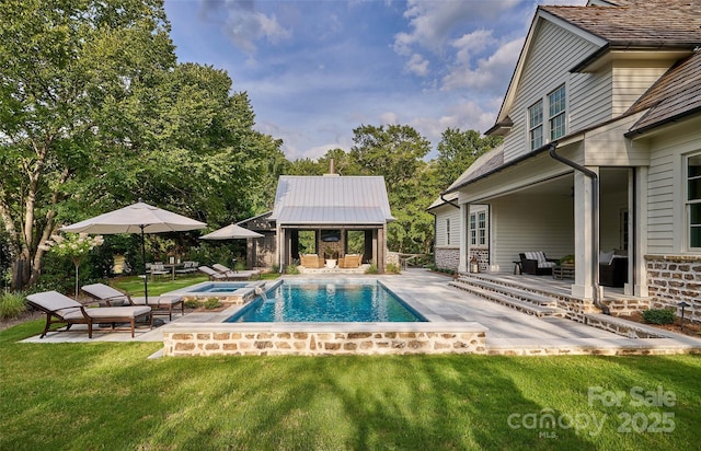 2270 New Gray Rock Rd, Fort Mill, SC 29708 - view of pool featuring a lawn, an outbuilding, an exterior structure, a patio, and a pool with connected hot tub