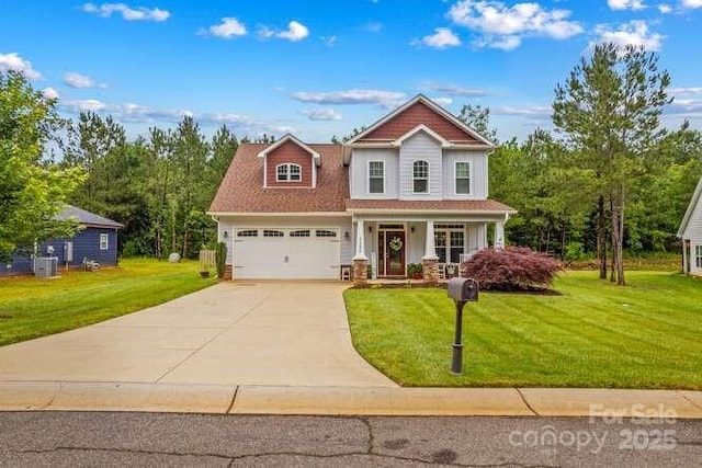 1155 Rudder Cir, Salisbury, NC 28146 - craftsman-style home with concrete driveway, a front lawn, covered porch, a garage, and central air condition unit