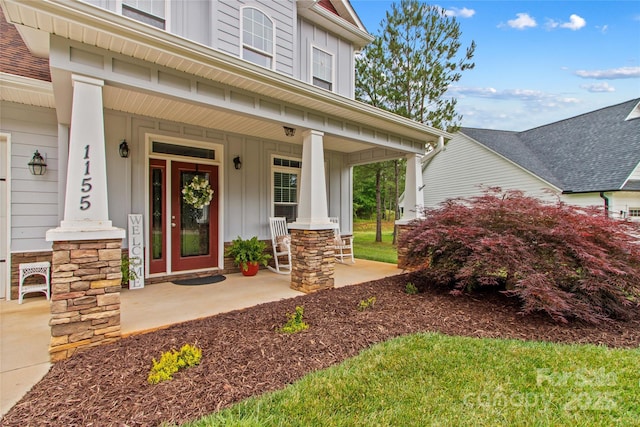 1155 Rudder Cir, Salisbury, NC 28146 - view of exterior entry with board and batten siding and covered porch