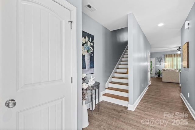 1155 Rudder Cir, Salisbury, NC 28146 - entryway with stairs, wood finished floors, baseboards, ceiling fan, and recessed lighting