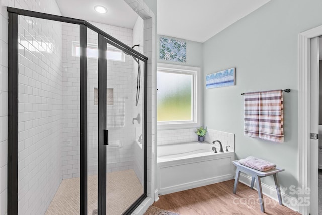 1155 Rudder Cir, Salisbury, NC 28146 - bathroom with a bath, a stall shower, and wood finished floors