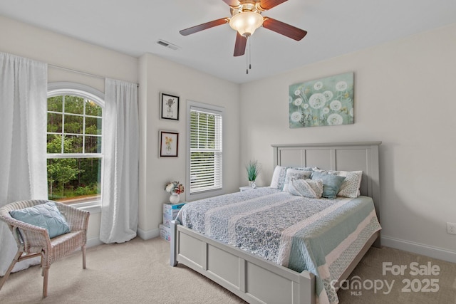 1155 Rudder Cir, Salisbury, NC 28146 - bedroom with light colored carpet, multiple windows, baseboards, and ceiling fan