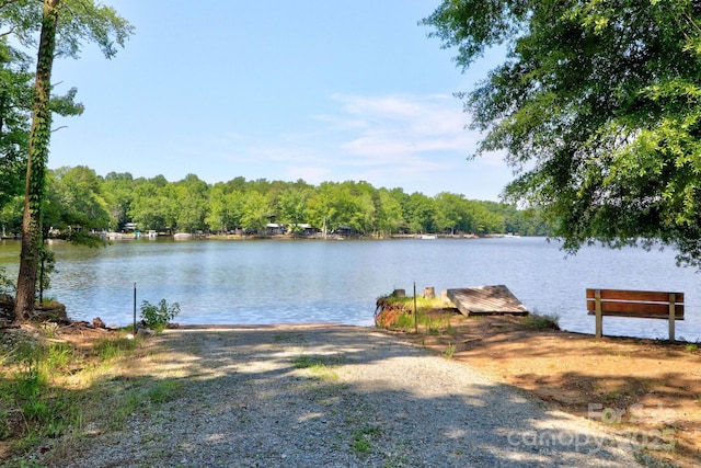 1155 Rudder Cir, Salisbury, NC 28146 - water view featuring a boat ramp, a boat dock, and a forest