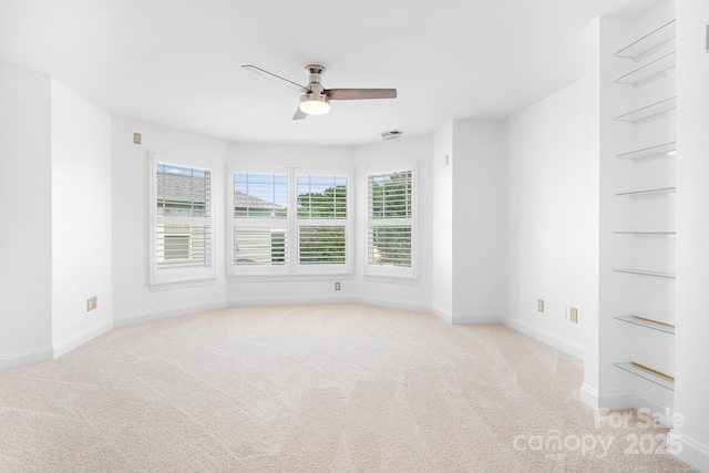 14923 Almondell Dr, Huntersville, NC 28078 - unfurnished room featuring built in features, a ceiling fan, baseboards, and carpet flooring