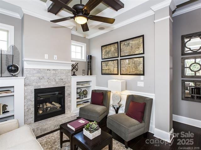 6510 Honeymeade Cir, Charlotte, NC 28277 - living area featuring crown molding, wood finished floors, a stone fireplace, ceiling fan, and baseboards