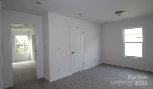 1922 Highland Park Dr, Charlotte, NC 28269 - empty room featuring carpet floors and baseboards