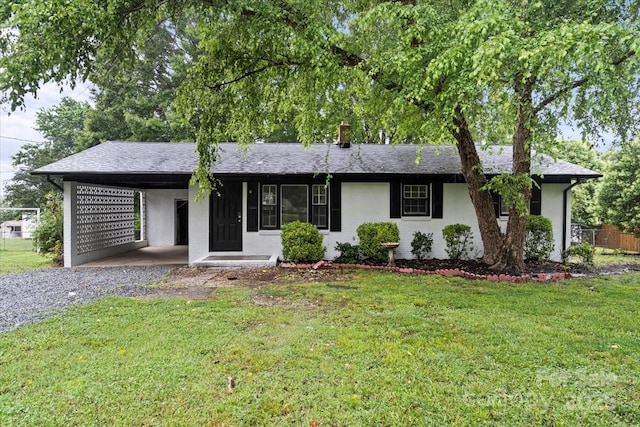 818 Stowe Ln, Gastonia, NC 28056 - ranch-style house featuring an attached carport, driveway, and a shingled roof