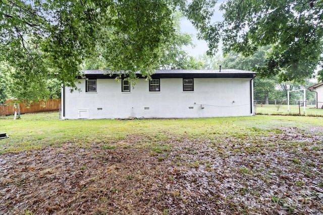 818 Stowe Ln, Gastonia, NC 28056 - rear view of property featuring crawl space and brick siding