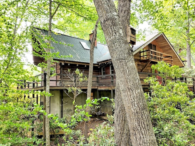 429 Biodome Dr, Waynesville, NC 28785 - back of property with roof with shingles and a chimney