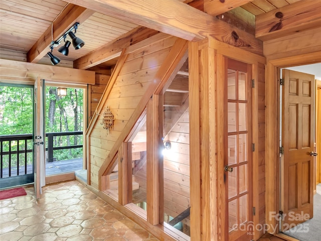 429 Biodome Dr, Waynesville, NC 28785 - doorway to outside featuring wood ceiling with exposed beams, wood walls, french doors, and track lighting