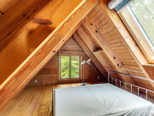 429 Biodome Dr, Waynesville, NC 28785 - unfurnished bedroom with wood-type flooring, lofted ceiling, wooden walls, and wood ceiling