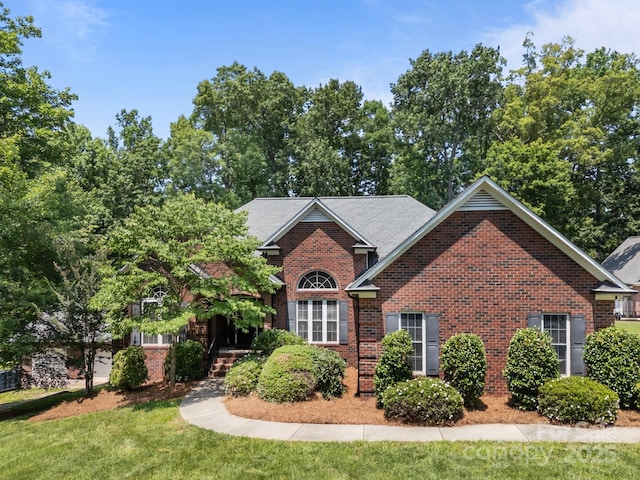 10501 Mount Olive Estates Dr Unit 7, Mount Pleasant, NC 28124 - view of front of property featuring brick siding and a front lawn
