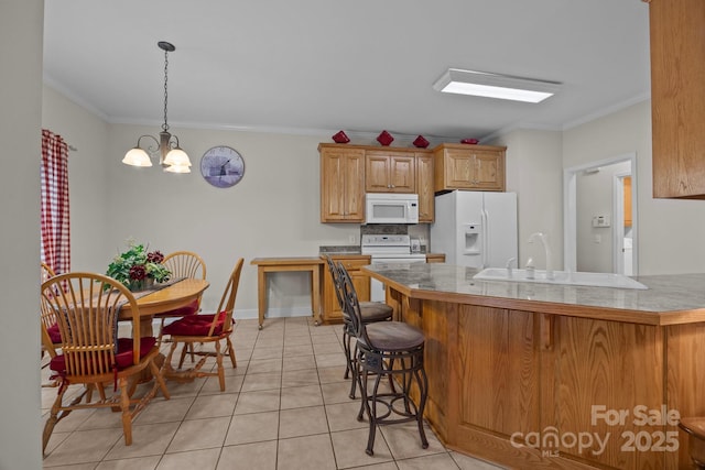 10501 Mount Olive Estates Dr Unit 7, Mount Pleasant, NC 28124 - kitchen with white appliances, ornamental molding, a peninsula, light tile patterned floors, and a chandelier