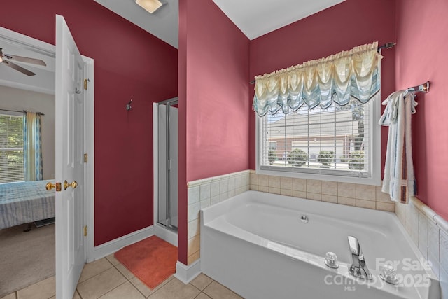 10501 Mount Olive Estates Dr Unit 7, Mount Pleasant, NC 28124 - ensuite bathroom featuring a garden tub, plenty of natural light, tile patterned floors, and a stall shower