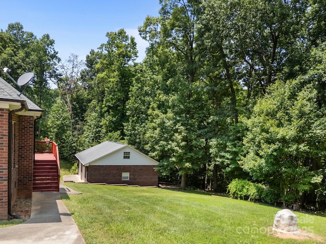 10501 Mount Olive Estates Dr Unit 7, Mount Pleasant, NC 28124 - view of grassy yard featuring an outdoor structure and stairway