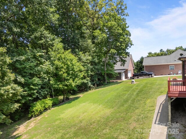 10501 Mount Olive Estates Dr Unit 7, Mount Pleasant, NC 28124 - view of grassy yard featuring a wooden deck