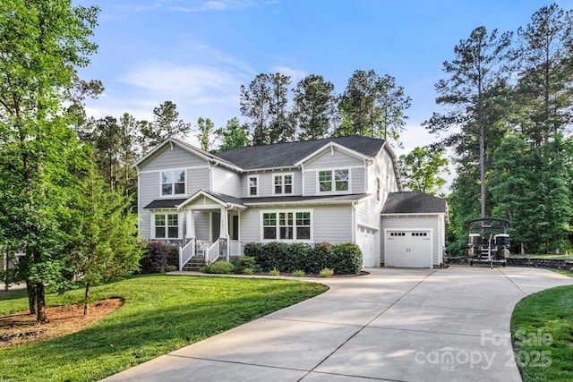 4189 Island Fox Ln, Denver, NC 28037 - traditional home with concrete driveway, a front lawn, and a garage