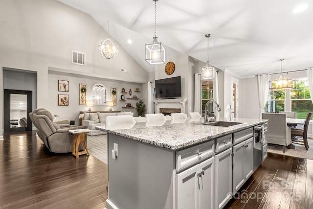 4189 Island Fox Ln, Denver, NC 28037 - kitchen with a sink, dark wood-style floors, open floor plan, a kitchen island with sink, and high vaulted ceiling