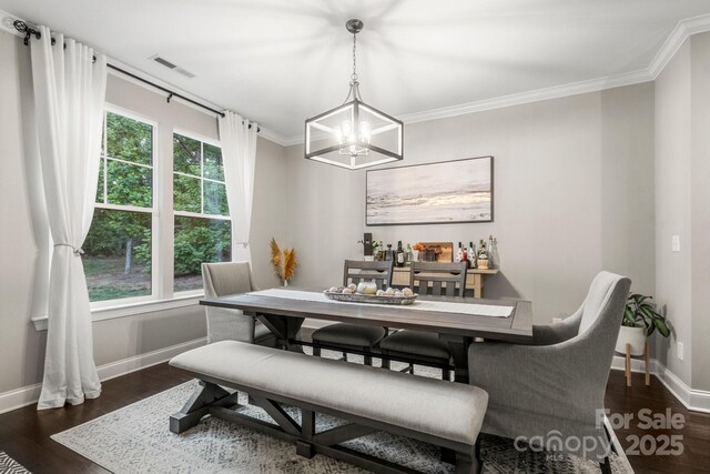 4189 Island Fox Ln, Denver, NC 28037 - dining space featuring baseboards, a chandelier, dark wood-style floors, and crown molding