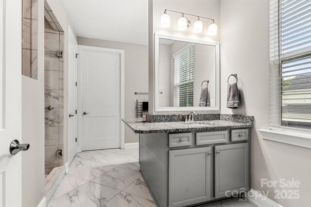 4189 Island Fox Ln, Denver, NC 28037 - full bath with marble finish floors, vanity, plenty of natural light, and a stall shower
