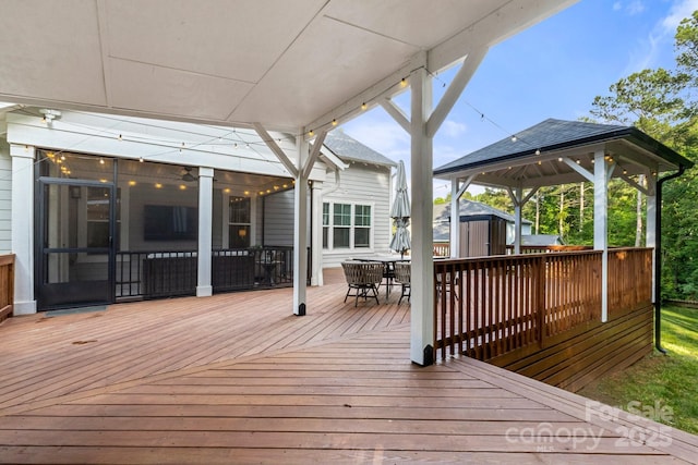 4189 Island Fox Ln, Denver, NC 28037 - deck featuring outdoor dining area and a sunroom