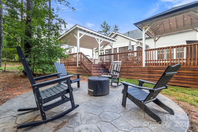 4189 Island Fox Ln, Denver, NC 28037 - view of patio featuring an outdoor fire pit and a wooden deck