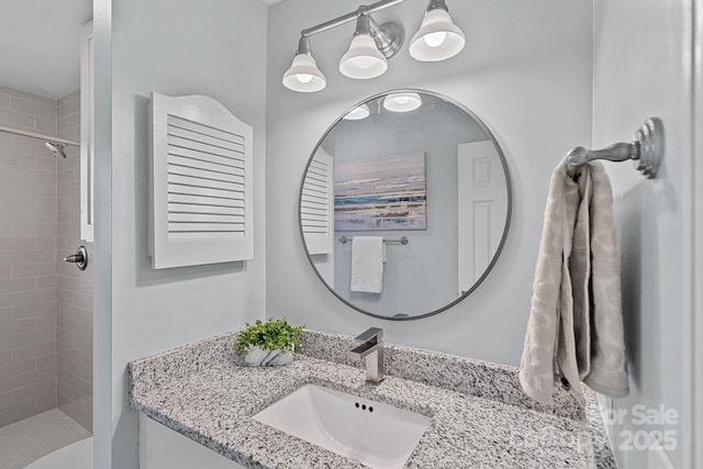 3308 Selwyn Farms Ln Unit 5, Charlotte, NC 28209 - bathroom with tiled shower and vanity