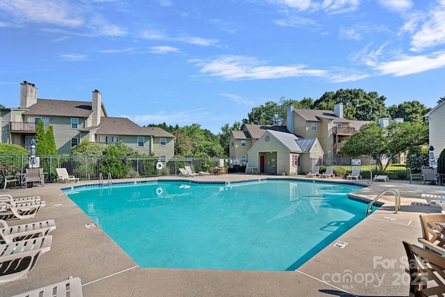 3308 Selwyn Farms Ln Unit 5, Charlotte, NC 28209 - community pool with a residential view and a patio area