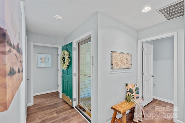 3308 Selwyn Farms Ln Unit 5, Charlotte, NC 28209 - hallway featuring wood finished floors and recessed lighting