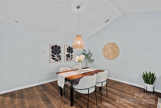 3308 Selwyn Farms Ln Unit 5, Charlotte, NC 28209 - dining area featuring vaulted ceiling and wood finished floors