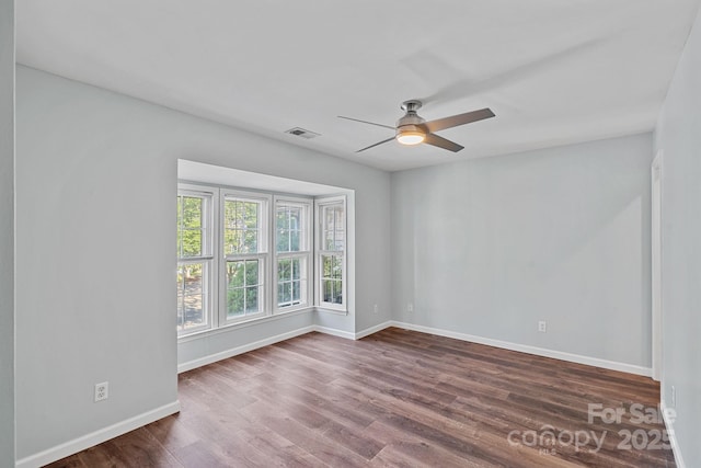 3308 Selwyn Farms Ln Unit 5, Charlotte, NC 28209 - unfurnished room with ceiling fan and dark wood-type flooring