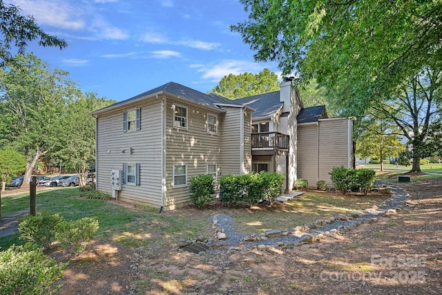 3308 Selwyn Farms Ln Unit 5, Charlotte, NC 28209 - view of side of home featuring a chimney and a balcony