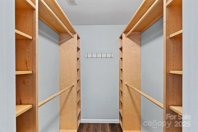 3308 Selwyn Farms Ln Unit 5, Charlotte, NC 28209 - walk in closet with dark wood-style floors