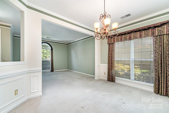 9419 Olivia Ln, Charlotte, NC 28277 - carpeted empty room with a chandelier and crown molding