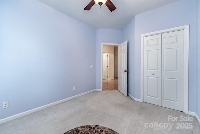 9419 Olivia Ln, Charlotte, NC 28277 - unfurnished bedroom with carpet, a closet, and ceiling fan