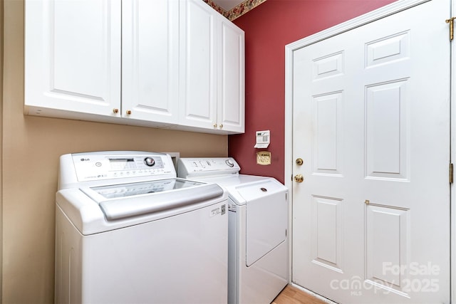 9419 Olivia Ln, Charlotte, NC 28277 - laundry room featuring cabinet space and washer and dryer