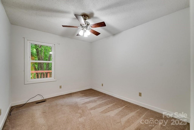 302 Mitchell Rd, Sylva, NC 28779 - empty room with a ceiling fan, carpet, a textured ceiling, and baseboards