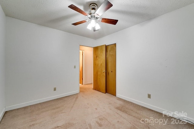 302 Mitchell Rd, Sylva, NC 28779 - carpeted spare room with baseboards, a ceiling fan, and a textured ceiling