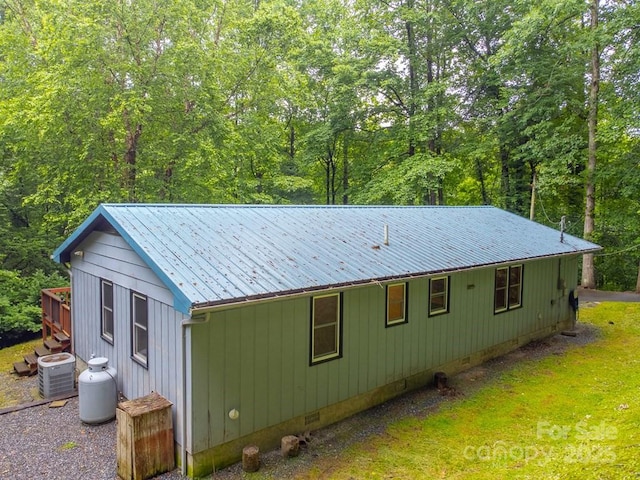 302 Mitchell Rd, Sylva, NC 28779 - view of side of property with central AC unit, crawl space, and metal roof